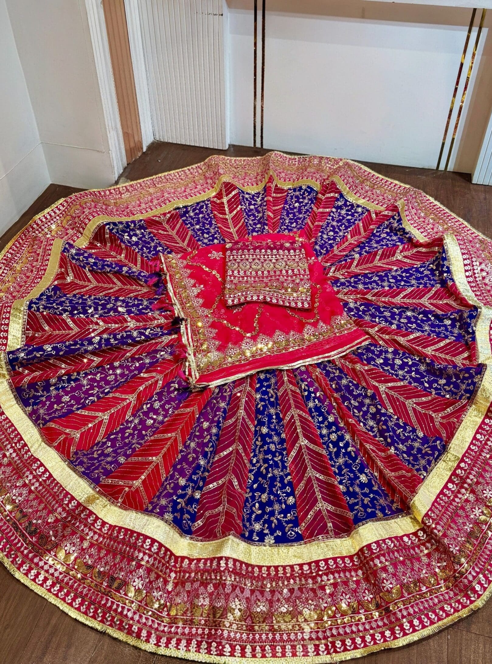 New Launch heavy boutique Rajputi Poshak featuring a 5 meter gher lehanga and designer 7 meter gher lehanga suit in premium quality georgette fabric with royal pure odhani. Designed with vintage style zari and sequence border work, heavy four-side odhani jaal work with fancy turri, and a 1.80 meter heavily embroidered kurti. Perfect for weddings and festive occasions.