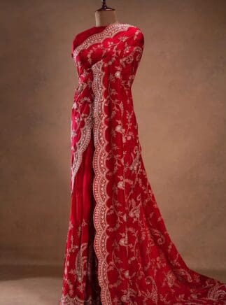 “Make a bold statement with this rich red saree, perfect for weddings, festivals, and special celebrations.”